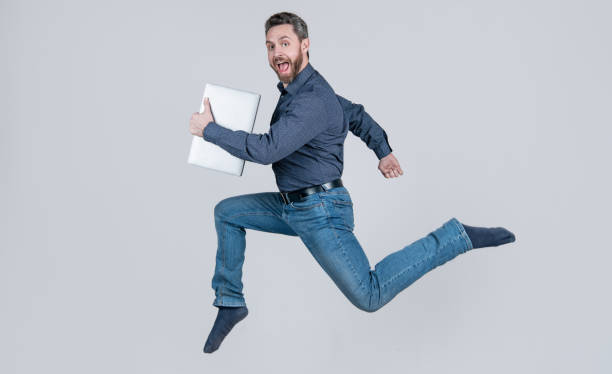 istock agile business. network administrator hold computer. energetic boss with wireless laptop 1429368983