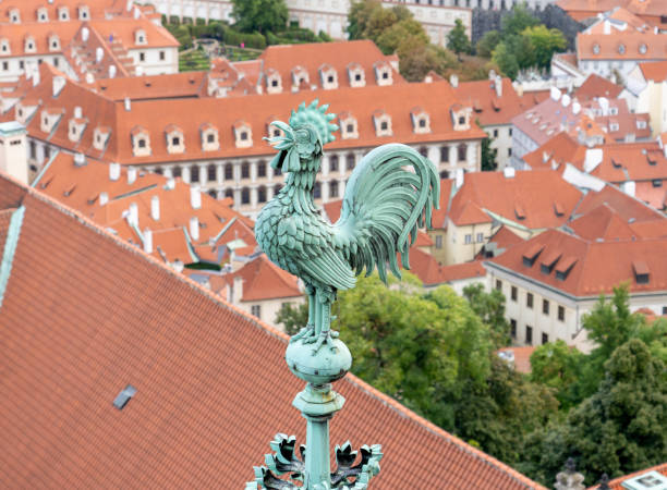 Copper chicken statue on roof stock photo