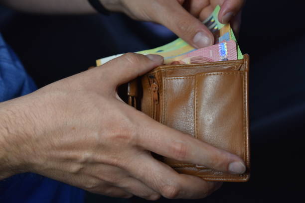 istock a purse with money in it 1429376470