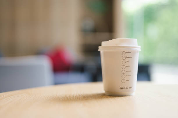 istock recyclingable paper hot coffee cup in cafe 1429383773