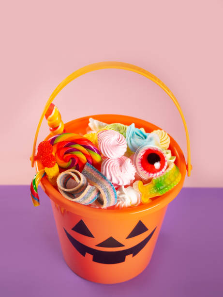 istock Halloween Jack o Lantern orange bucket with candy 1429385554