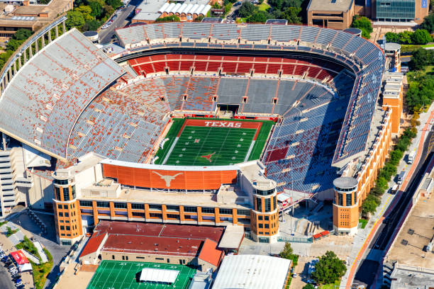 Darrell K Royal - Texas Memorial Stadium Aerial Austin, United States - September 29, 2022: Aerial view of the Darrell K. Royal - Texas Memorial Stadium on the campus of the University of Texas at Austin which seats over 100,000 and is the home of the Texas Longhorns. The stadium is a publicly constructed and maintained facility on the campus of this public university. university of texas austin stock pictures, royalty-free photos & images