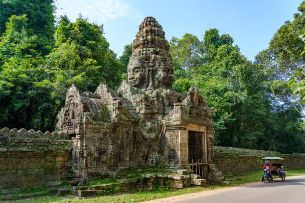 Cambodia. The archaeological park of Angkor. Banteay Kdei Temple Cambodia. Siem Reap Province. The archaeological park of Angkor. A Buddha sculpture of a north gate of Banteay Kdei temple khmer stock pictures, royalty-free photos & images