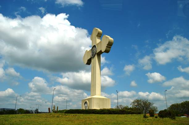 istock a large white cross on the roundabout 1429391448