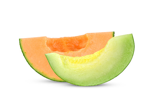 Slices of cantaloupe melon isolated on white background.