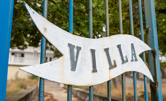 Villa sign at entrance gate