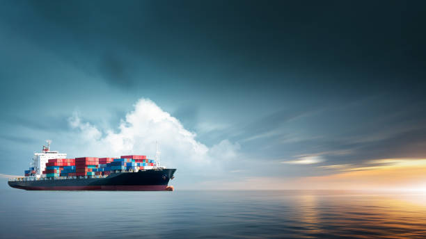 istock Container cargo ship in ocean at sunset dramatic sky background with copy space, Nautical vessel and sea freight shipping, International global business logistics transportation import export concept 1429398919