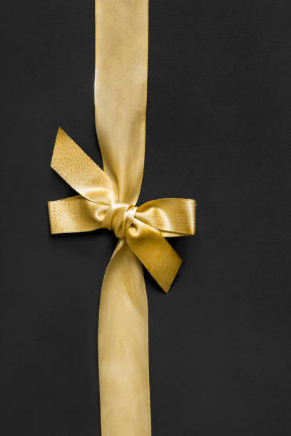 istock Golden ribbon on black 1429405808