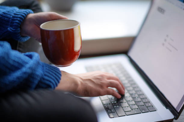 istock Young woman with laptop indoors 1429410930