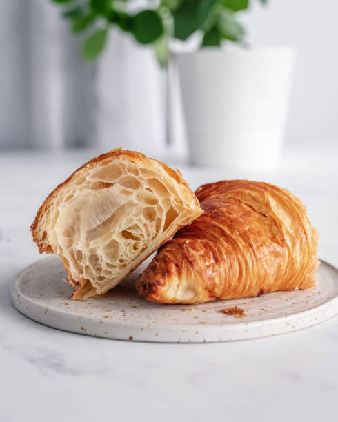 istock Two halves of a croissant 1429413582