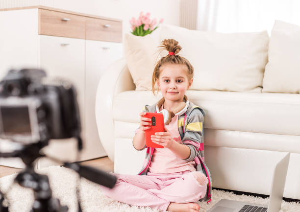 istock Little girl recording video 1429413759