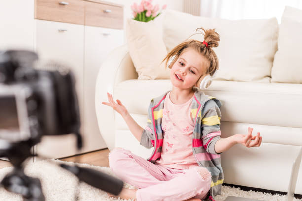 istock Little girl recording video 1429413773