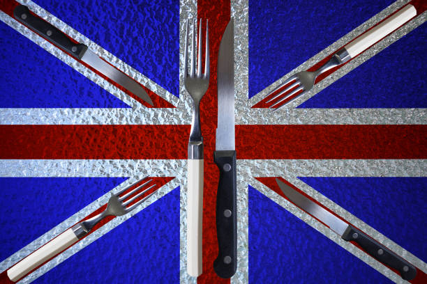 istock Table set on United Kingdom flag background  British gastronomy 1429413856