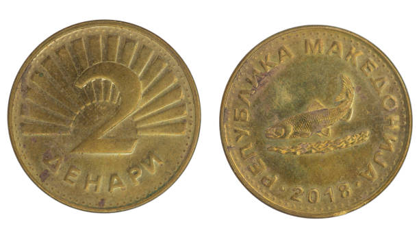 istock 2 Macedonian Denar (MKD) coin with both sides on isolated white background 1429416615