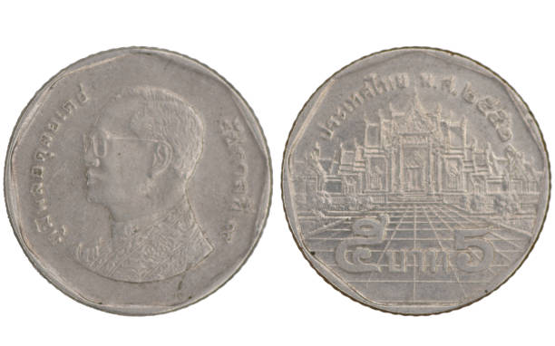 istock 5 Thai Baht coin used from both sides on white background 1429416632