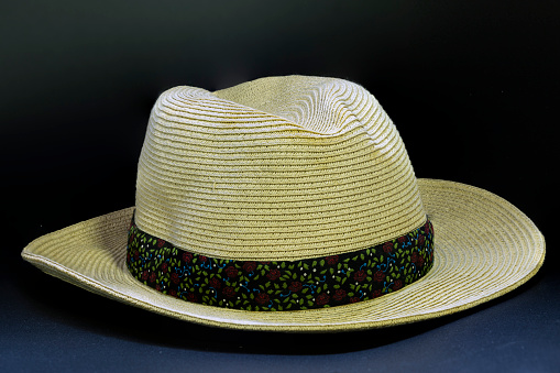 photography of hats with a black background