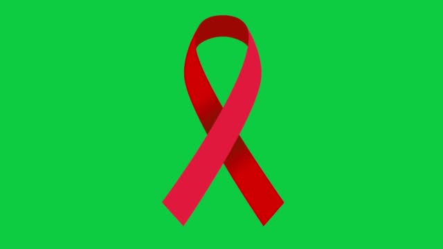 4K Red color mourning ribbon stock animation. Red color awareness video. Green screen for chroma keying.