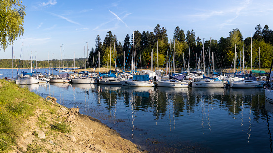 Vacations in Poland - view of marina in  the spa village of Polanczyk on the Lake Solina,  Bieszczady Mountains in background