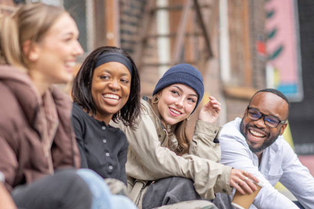 istock Youth Sitting Outside Together 1429443612