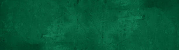 istock Dark abstract grunge green color colored painted stone concrete paper texture background banner, top view 1429444029