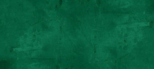 istock Dark abstract grunge green color colored painted stone concrete paper texture background banner, top view 1429444538