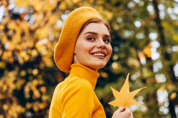 istock Beautiful woman enjoying autumn 1429449565