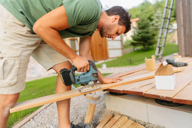 istock Carpenter cutting a wooden board 1429454536