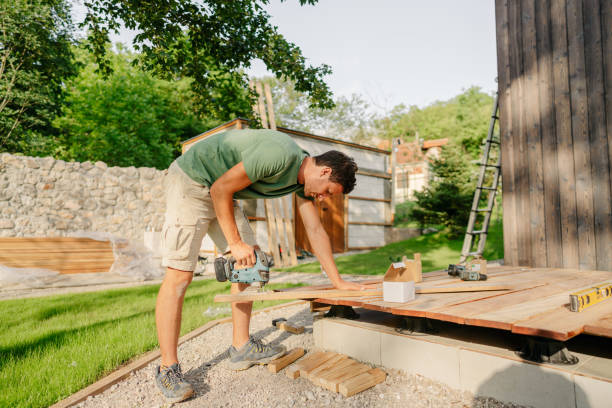istock Carpenter cutting a wooden board 1429454559