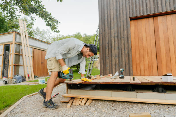 istock Carpenter cutting a wooden board 1429454853