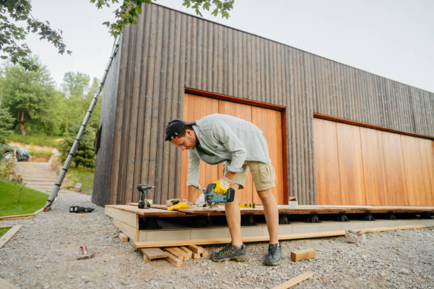 istock Carpenter cutting a wooden board 1429455365