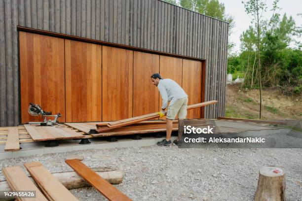 Timber Boards Installation Carpenter Installing Timber Decking Boards Stock Photo - Download Image ...