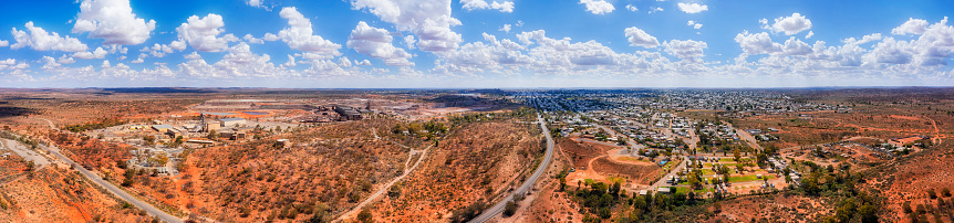 Aerial panorama over incoming Barrier highway to Broken Hill city - australian outback and mining industry.