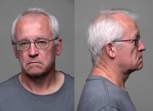 serious senior man front and profile mugshots - 60 69 jaar fotos stockfoto's en -beelden