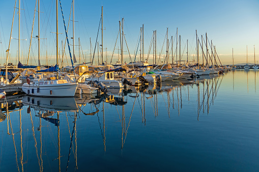 Closeup bow of luxury yacht with anchor, background with copy space, vertical composition