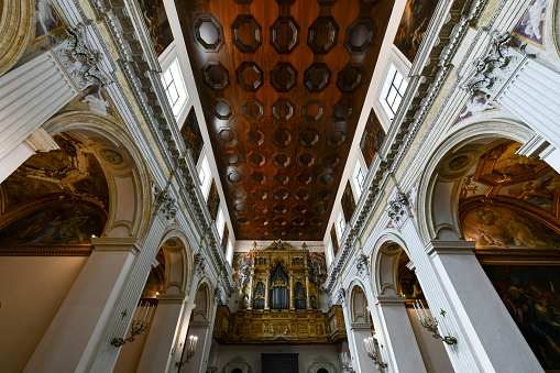 Interior of the gothic church San Zanipolo (Basilica di Santi Giovanni e Paolo). The actual church building proges was startet in 1333 and completed in 1430. The funeral services of all of Venice's doges were held in that church. The image was captured during the worldwide coronavirus epidemic (COVID19).