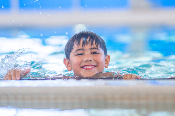 istock Young Boy in a Swimming Lesson 1429469409