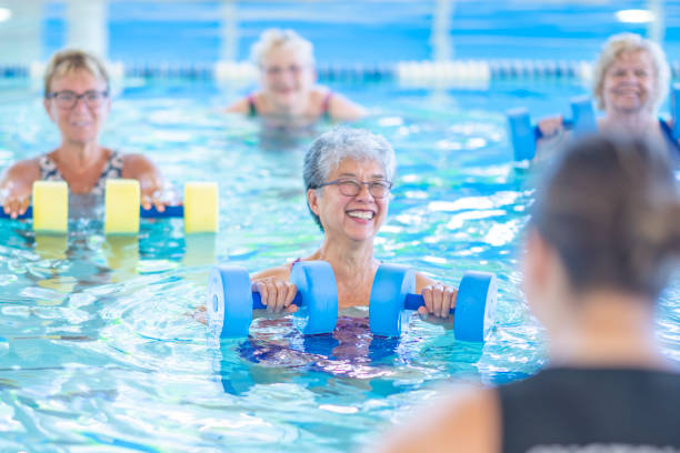 istock Instructor Leading an Seniors Aqua Fitness Class 1429492741