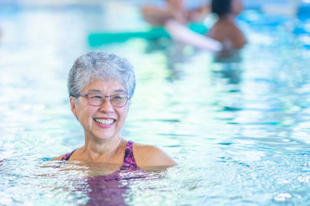 istock Senior Woman Treading Water 1429492778