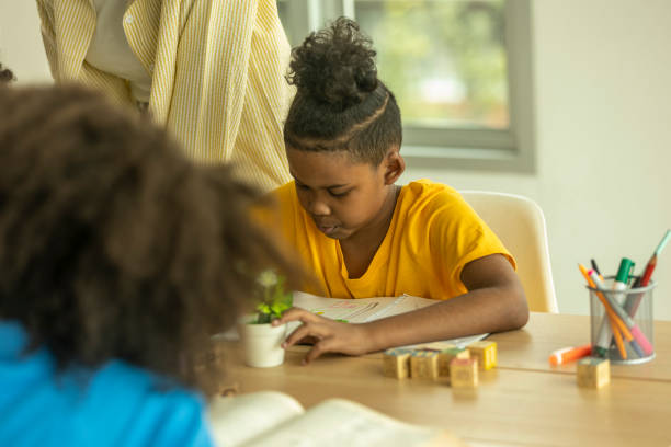 istock Young happy kids enjoy study with friends 1429492981