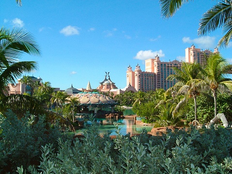 Nassau, Bahamas - October 28, 2002 : Luxurious Atlantis Resort hotel in Paradise Island. There are many waterslides, lazy rivers, rock climbing, private beaches and golf courses here.\nIndoors, there is an aquarium, a casino, and five hotel buildings.