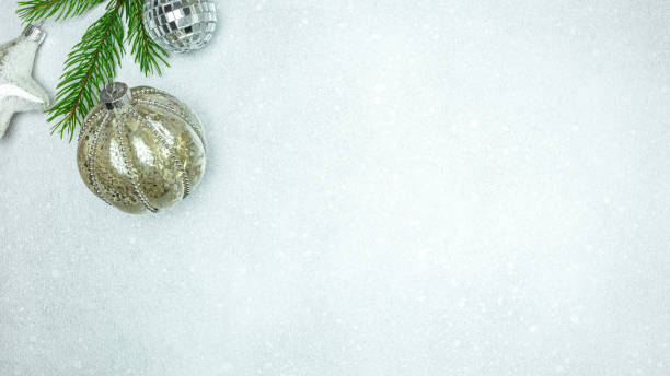 istock new year decorations on silver background. glittering glass balls with silver star. top view, copy space. 1429525310