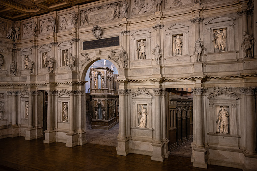 Vicenza, Italy - August 13 2022: Teatro Olimpico or Olympic Theater Interior by Andrea Palladio with Roman Style Scaenae Frons Back Screen on the Stage.
