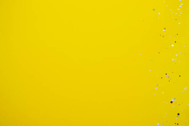 istock Yellow background with glitter. Copy space for text. Flat lay, top view, copy space. Design for text. 1429549760