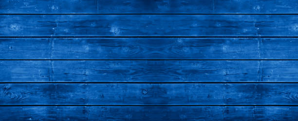 istock Abstract grunge rustic old dark blue painted colored wooden board wall table floor texture - wood background top view 1429552945