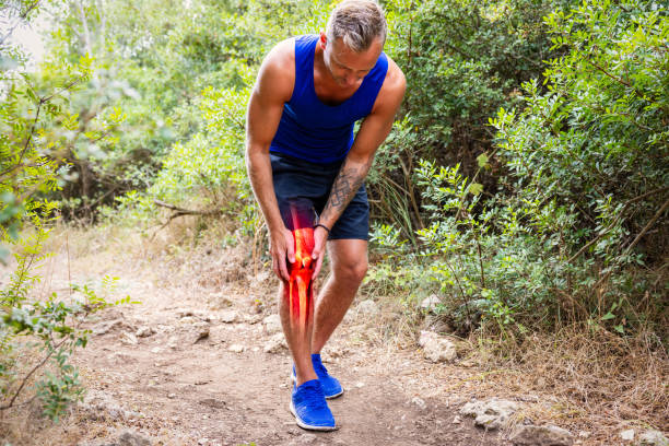 Man feeling injured knee joint pain