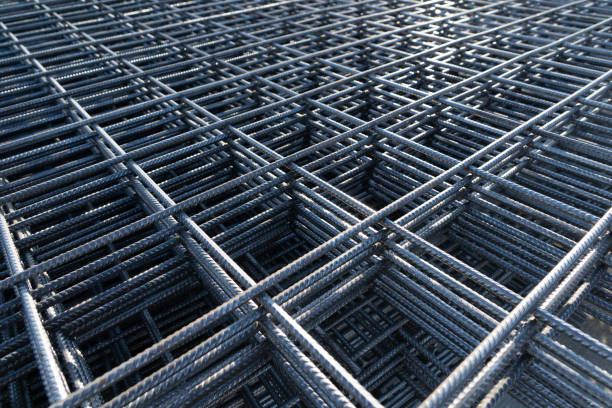 The rebar is bonded with steel wire for use as a construction infrastructure. Which part of the rebar has rusted due to chemical reactions. stock photo