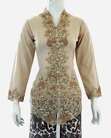 Women's kebaya with long sleeves and beautiful brocade decoration from neck to front. Oriental and Javanese style clothing, looks elegant when used in formal events.