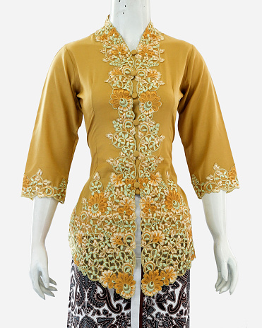 Women's kebaya with half sleeves and beautiful brocade decoration from neck to front. Oriental and Javanese style clothing, looks elegant when used in formal events.