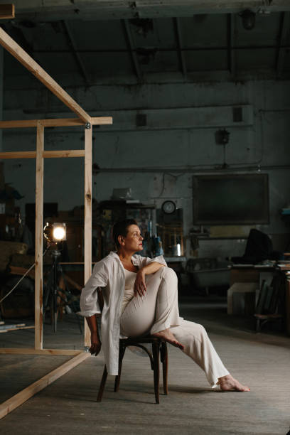 istock A mature woman poses in a film studio. 1429560573
