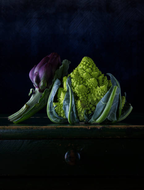 istock Artichoke and Romanesco cauliflower broccoli 1429564494